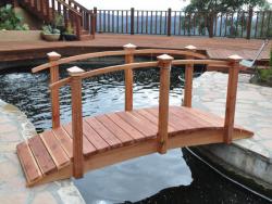 Here we have a very nice 10 foot single rail copper top post sealed bridge,  over a big pool /Koi pond ,Located at a winery in the Santa Cruz mountains .