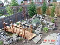 Here we have a 12 ft half spindle bridge with black Solar lights.Located in Washougal WA.
