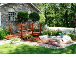 Here we go with a 12 foot 3 beam 4 foot   wide bridge ,Which the customer did a Great job of Sealing it and a fantastic job of landscaping Located in Meridian MI. 