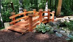Here is a custom bridge , Its a 10ft x 3 ft top rail is 24 " above the walking surface, Heavy duty grooved rails 4 post on each side.! Solar lights,
